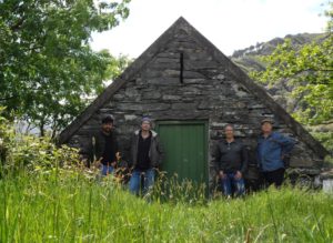 The cover of Torn Jacket - standing in front of the boathouse on Glanmore lake